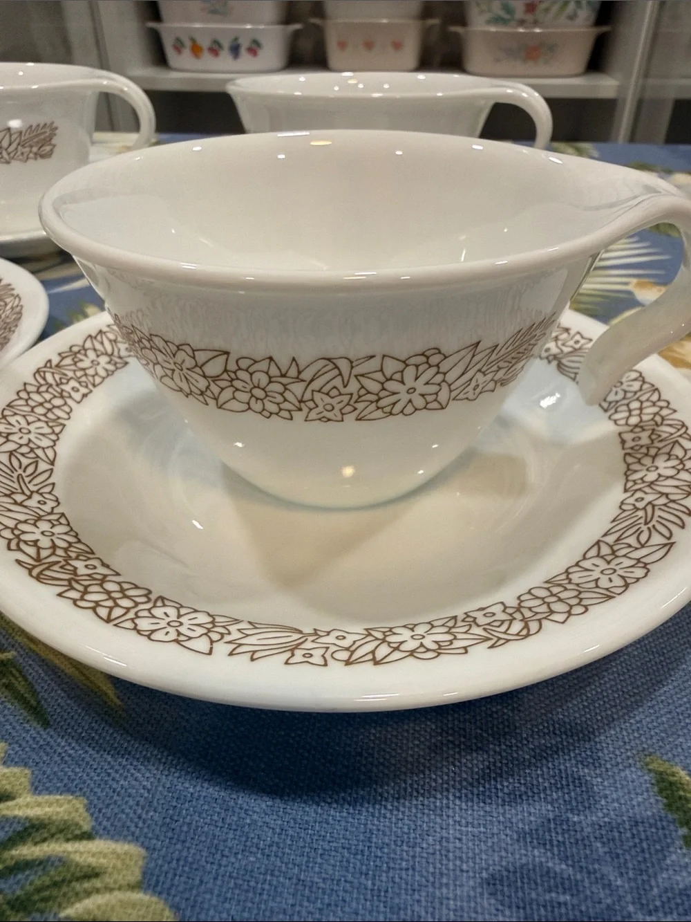Corelle set of four cups and saucers Woodland design.